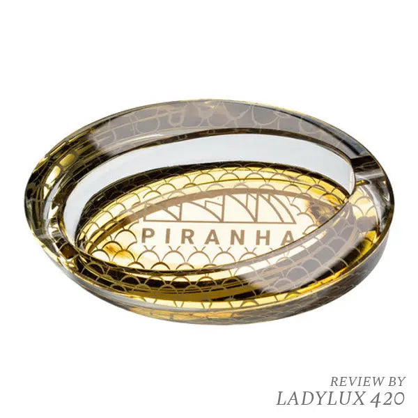 Piranha oval glass ash tray with elegant gold scales pattern – stylish and durable design.