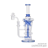 Human Grade straight recycler dab rig with blue accents – durable, sleek design for smooth hits. Hero