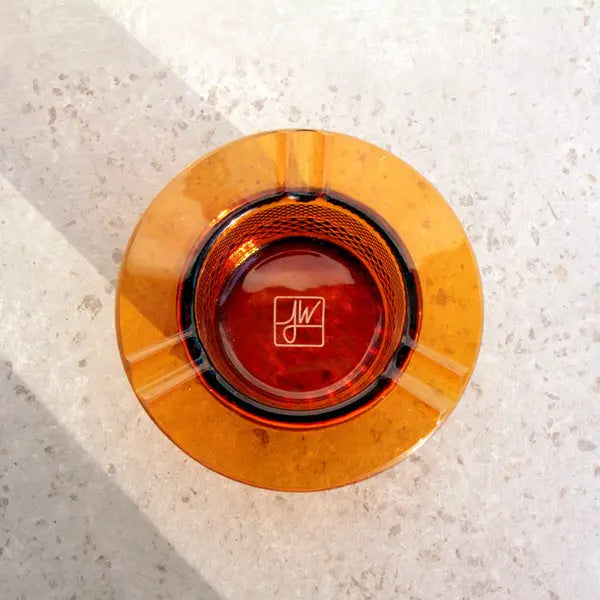 Jane West 20's Collection Ashtray – premium designer glass ashtray for stylish smoking setups - amber lifestyle